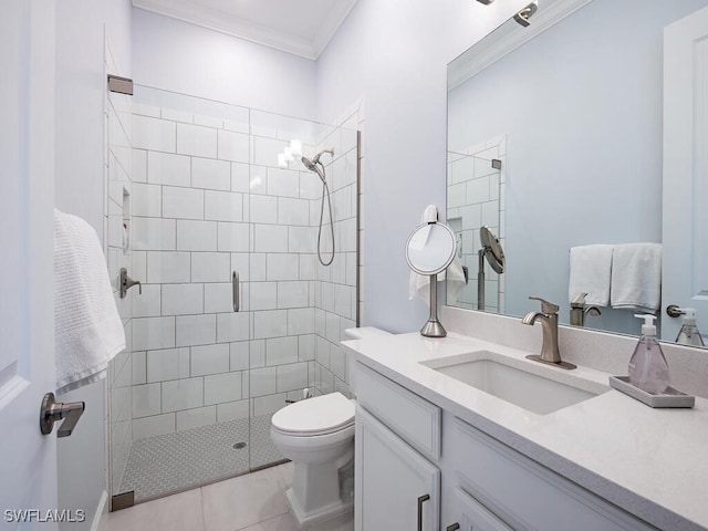 bathroom featuring toilet, tile patterned flooring, ornamental molding, vanity, and an enclosed shower