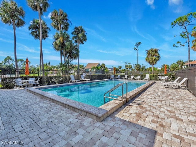 view of swimming pool featuring a patio