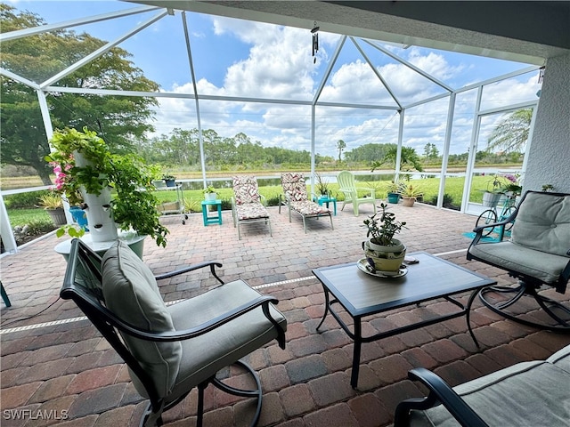 view of patio / terrace with a lanai