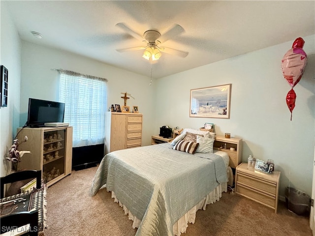 bedroom featuring carpet and ceiling fan