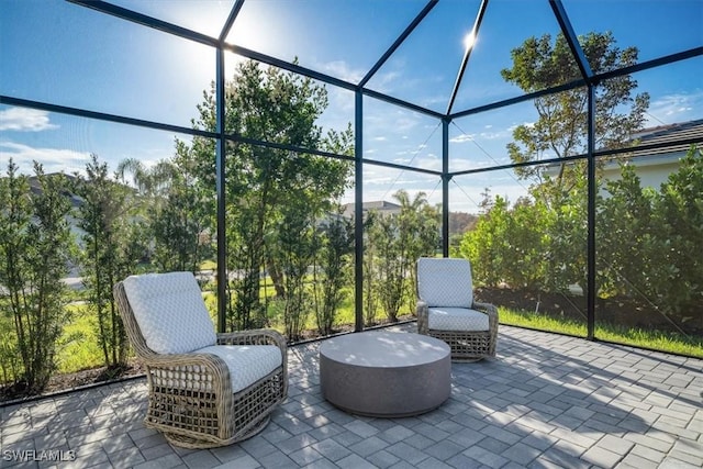 view of patio / terrace with a lanai