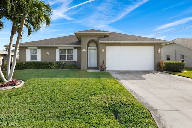 ranch-style home featuring a front lawn and a garage