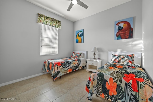 bedroom featuring ceiling fan and light tile patterned flooring