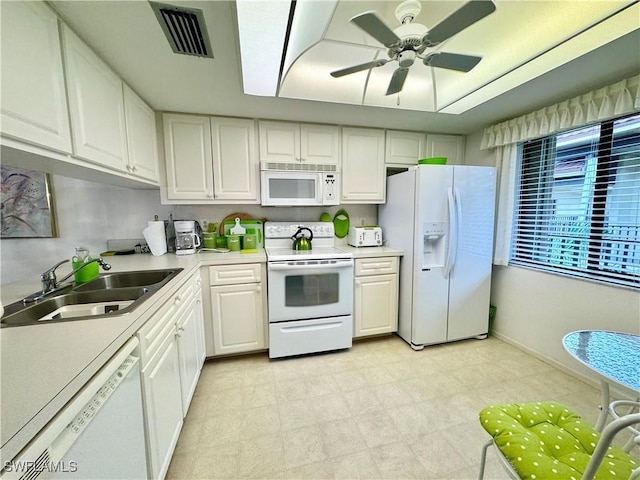 11220 Caravel Cir Unit 305, Fort Myers, FL 33908 - kitchen with white appliances, a sink, and white cabinets