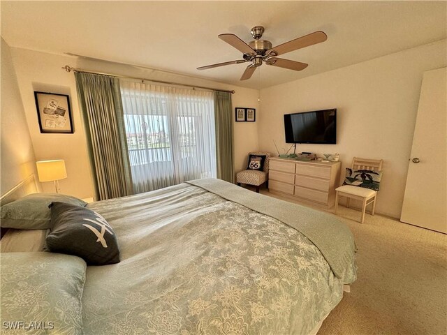 11220 Caravel Cir Unit 305, Fort Myers, FL 33908 - carpeted bedroom featuring a ceiling fan