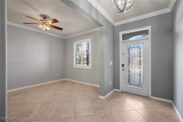 foyer with ornamental molding, light tile patterned floors, and ceiling fan with notable chandelier