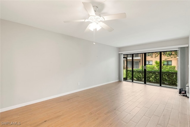 unfurnished room with ceiling fan and light hardwood / wood-style flooring