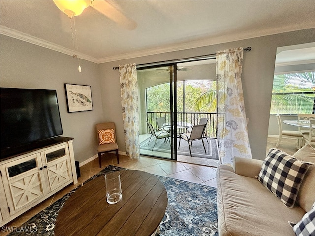 living room featuring ceiling fan, crown molding, and light tile patterned floors