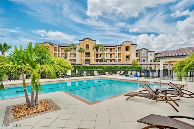 view of swimming pool with a patio