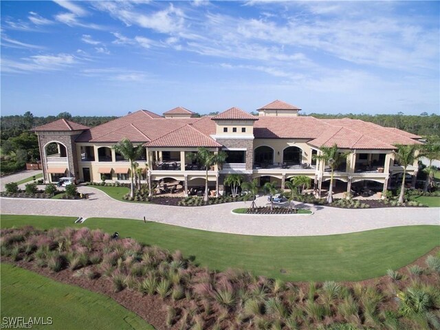 9834 Giaveno Cir Unit 1723, Naples, FL 34113 - view of home's community featuring a yard