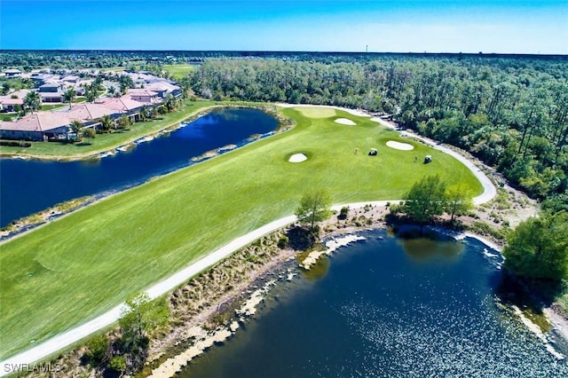 9834 Giaveno Cir Unit 1723, Naples, FL 34113 - bird's eye view featuring golf course view, a residential view, and a water view
