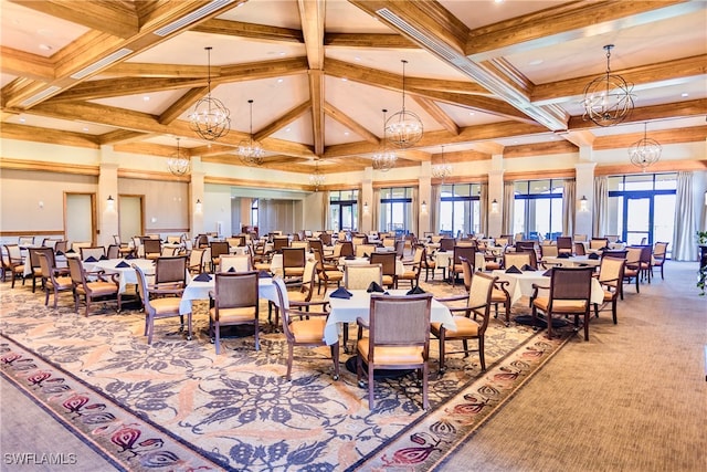 miscellaneous room featuring coffered ceiling, french doors, beam ceiling, carpet flooring, and a towering ceiling