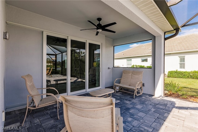 view of patio / terrace featuring ceiling fan