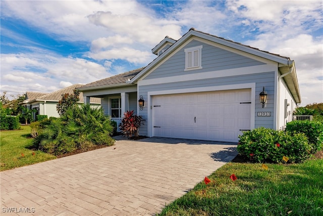 view of front of property with a garage