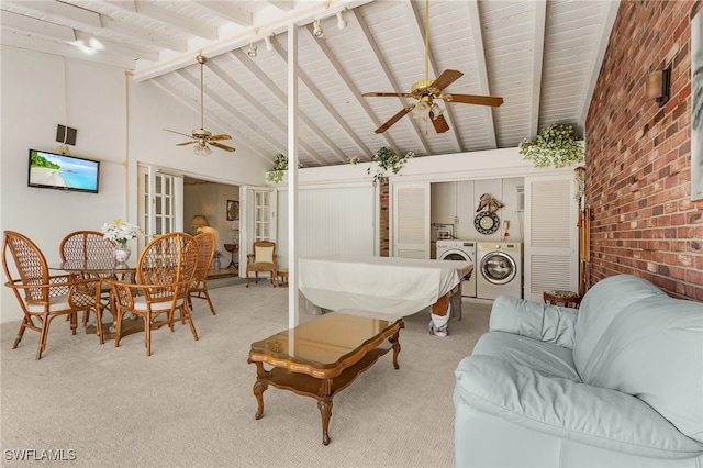 carpeted living room featuring beamed ceiling, separate washer and dryer, high vaulted ceiling, and ceiling fan