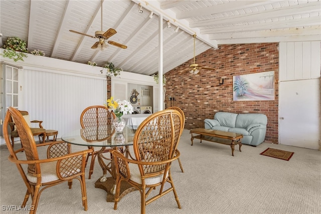 sunroom with vaulted ceiling with beams and ceiling fan