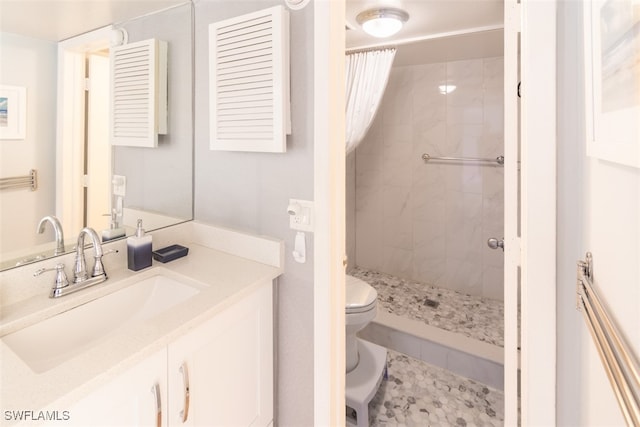 bathroom with toilet, vanity, a shower with shower curtain, and tile patterned flooring