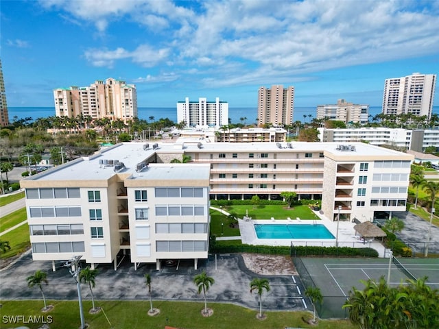 birds eye view of property with a water view