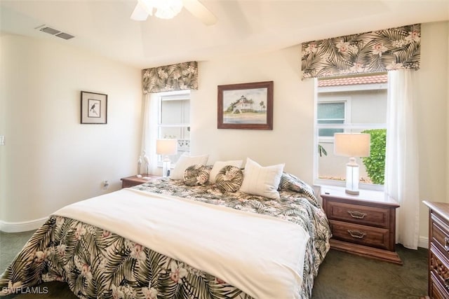 carpeted bedroom with ceiling fan