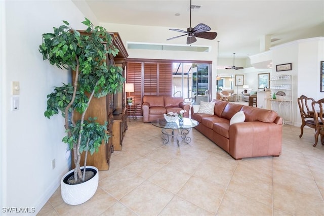 tiled living room with ceiling fan