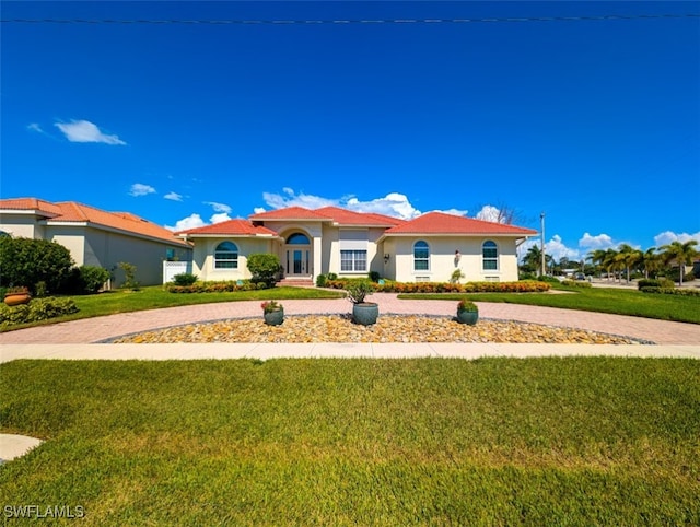 view of front facade featuring a front yard