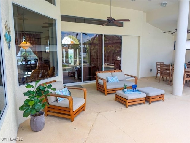 view of patio featuring ceiling fan