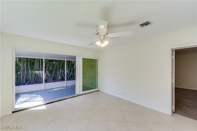 empty room featuring ceiling fan