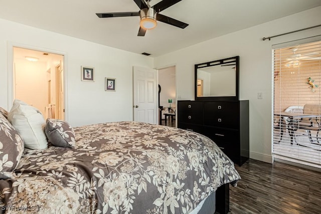 bedroom featuring ceiling fan, dark hardwood / wood-style flooring, and connected bathroom