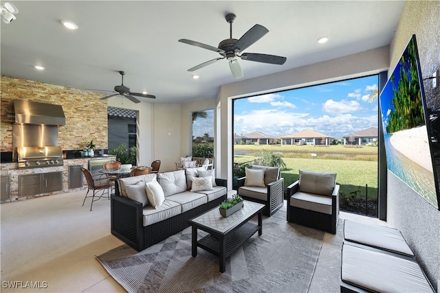 interior space featuring area for grilling, ceiling fan, grilling area, and outdoor lounge area