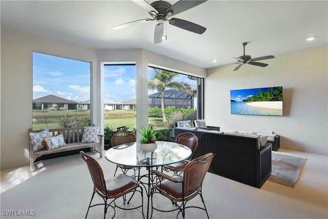 dining room featuring ceiling fan