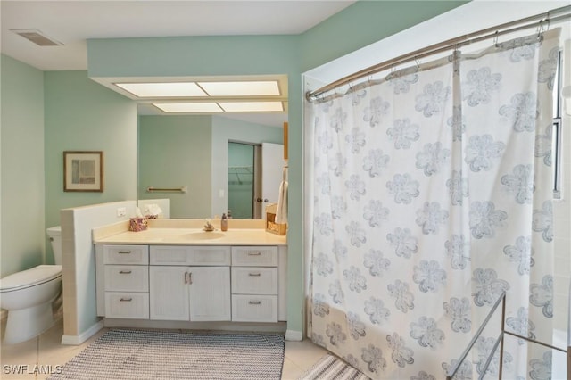 full bath featuring tile patterned floors, visible vents, toilet, shower / bath combination with curtain, and vanity