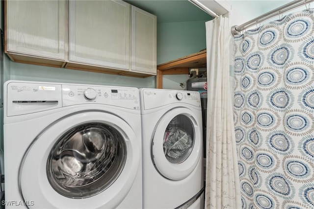 laundry room featuring washing machine and dryer and laundry area