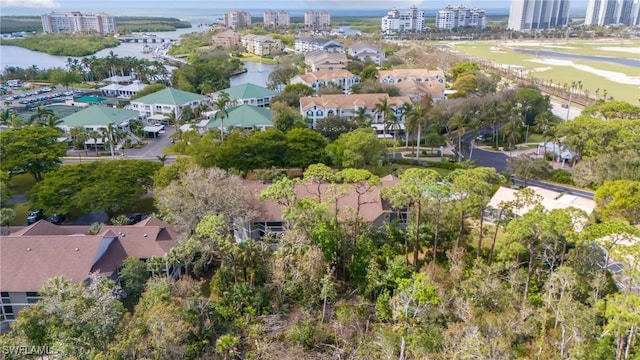 aerial view with a residential view and a water view