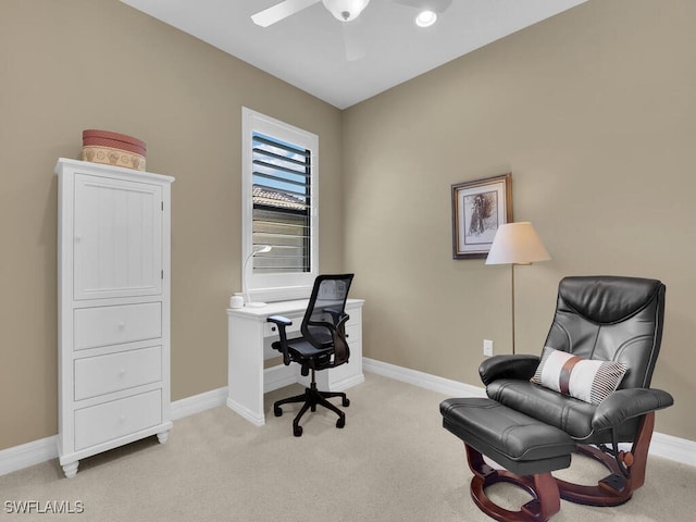 office area with light carpet and ceiling fan