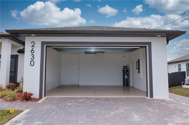 garage featuring water heater