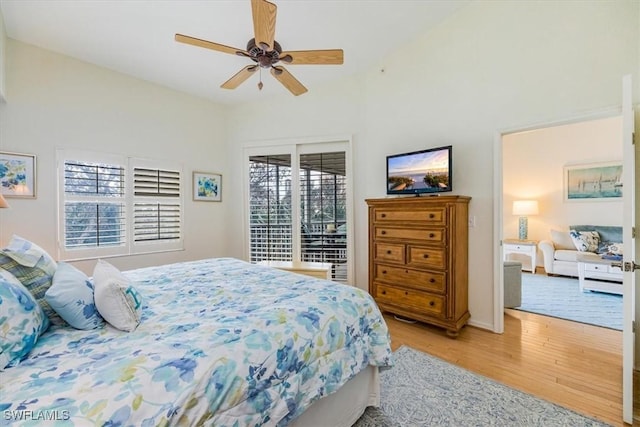 7725 Pebble Creek Cir Unit 8-303, Naples, FL 34108 - bedroom with wood finished floors, a ceiling fan, and baseboards