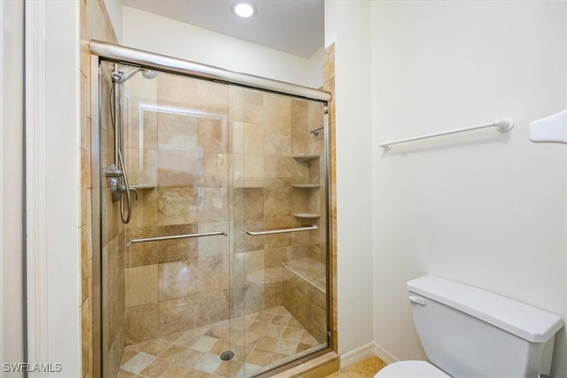 7725 Pebble Creek Cir Unit 8-303, Naples, FL 34108 - bathroom featuring toilet, a shower stall, baseboards, and recessed lighting