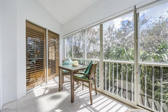 7725 Pebble Creek Cir Unit 8-303, Naples, FL 34108 - sunroom / solarium with plenty of natural light and lofted ceiling