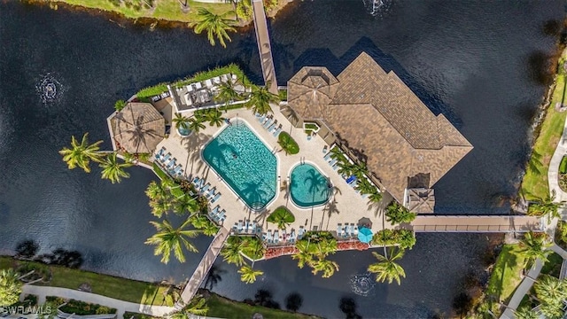 7725 Pebble Creek Cir Unit 8-303, Naples, FL 34108 - drone / aerial view of a pool and a large body of water