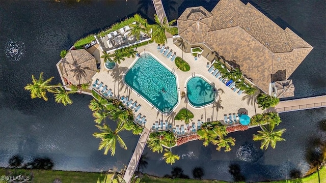 7725 Pebble Creek Cir Unit 8-303, Naples, FL 34108 - bird's eye view of a pool and a nearby body of water