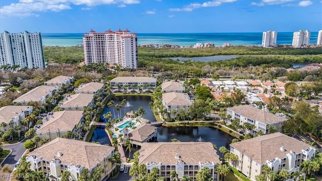 7725 Pebble Creek Cir Unit 8-303, Naples, FL 34108 - aerial view of residential area with a large body of water