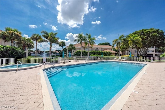 7725 Pebble Creek Cir Unit 8-303, Naples, FL 34108 - community pool with a hot tub