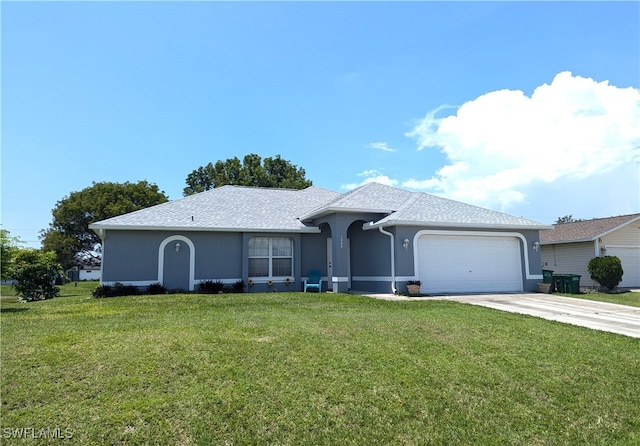 ranch-style home featuring a garage and a front lawn