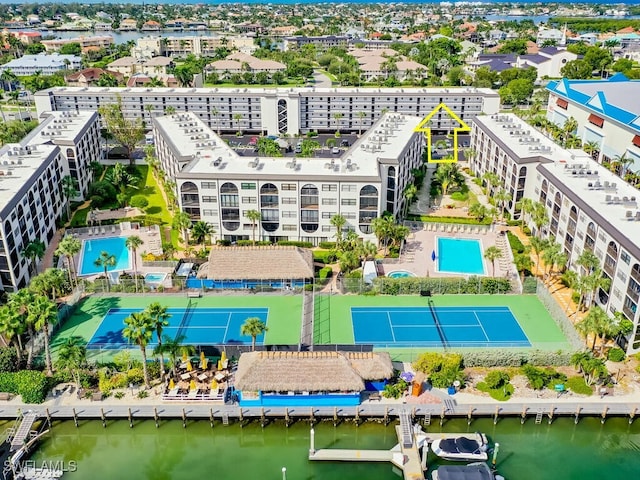 birds eye view of property featuring a water view
