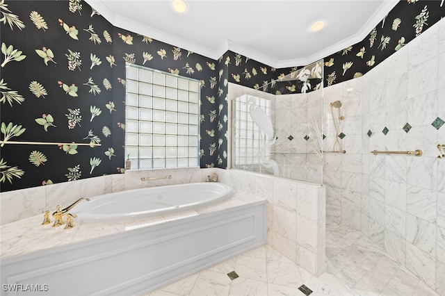 bathroom featuring ornamental molding and separate shower and tub