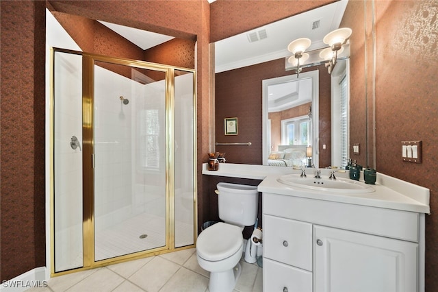 bathroom with an enclosed shower, vanity, tile patterned flooring, and toilet