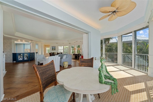 sunroom / solarium with ceiling fan