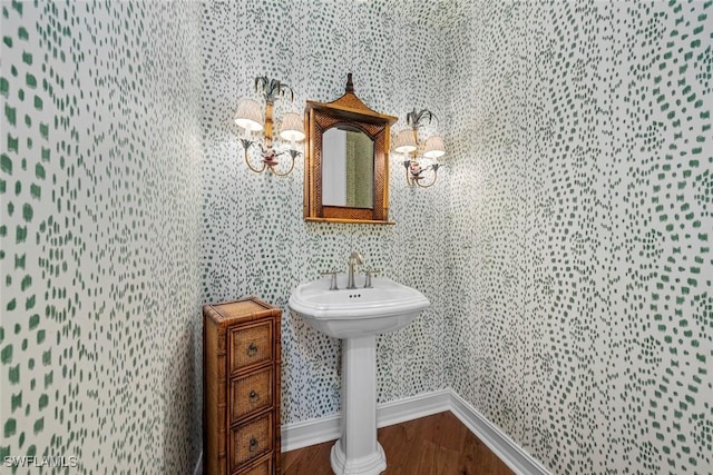 bathroom with hardwood / wood-style flooring