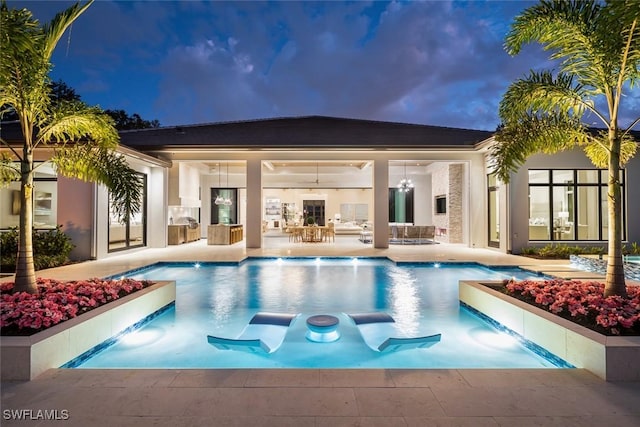 137 Tupelo Rd, Naples, FL 34108 - outdoor pool featuring a patio area