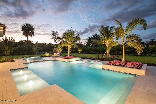 137 Tupelo Rd, Naples, FL 34108 - pool at dusk with a yard and a pool with connected hot tub